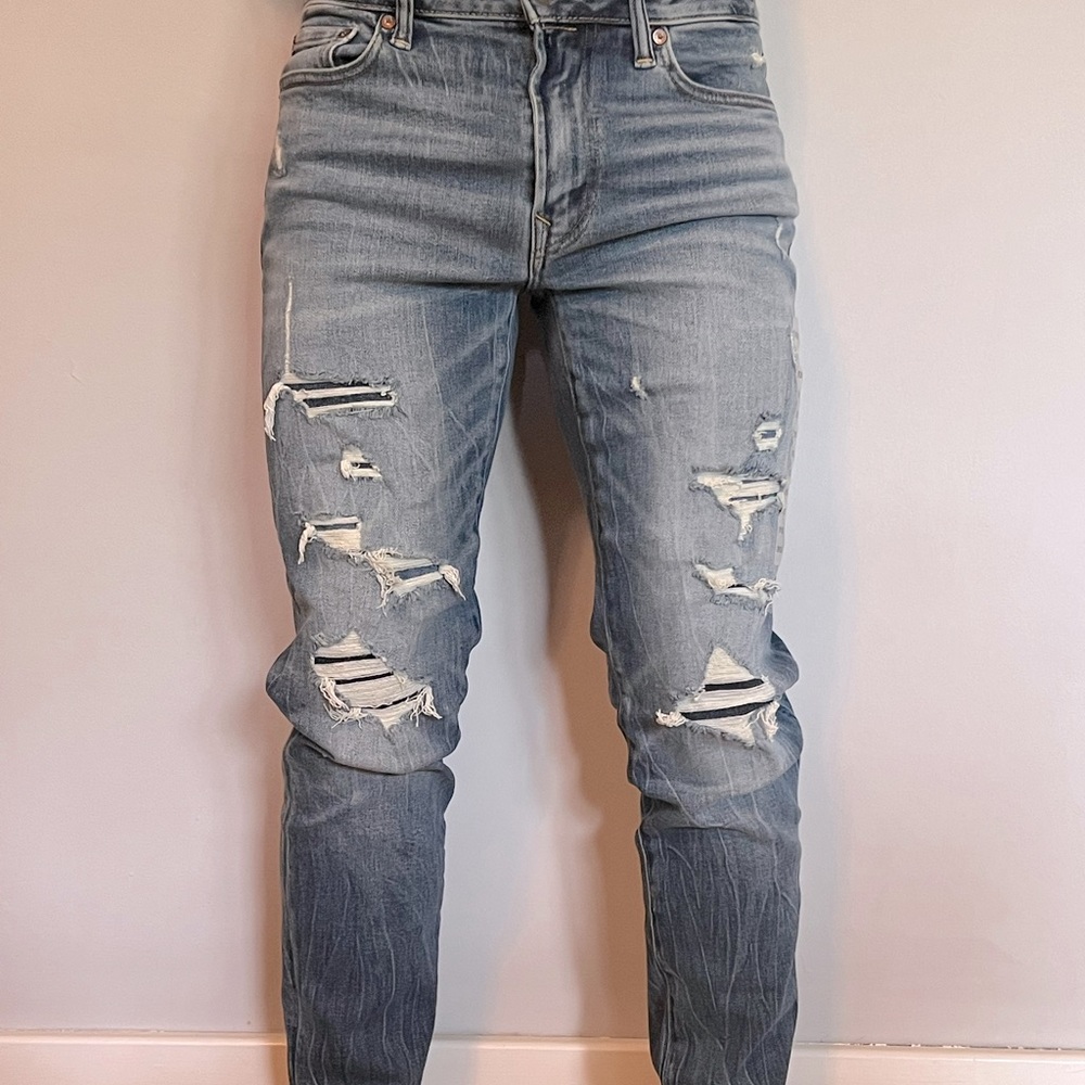 American eagle jeans.  Size 29/30. Stretch with rips. Dark to medium wash.